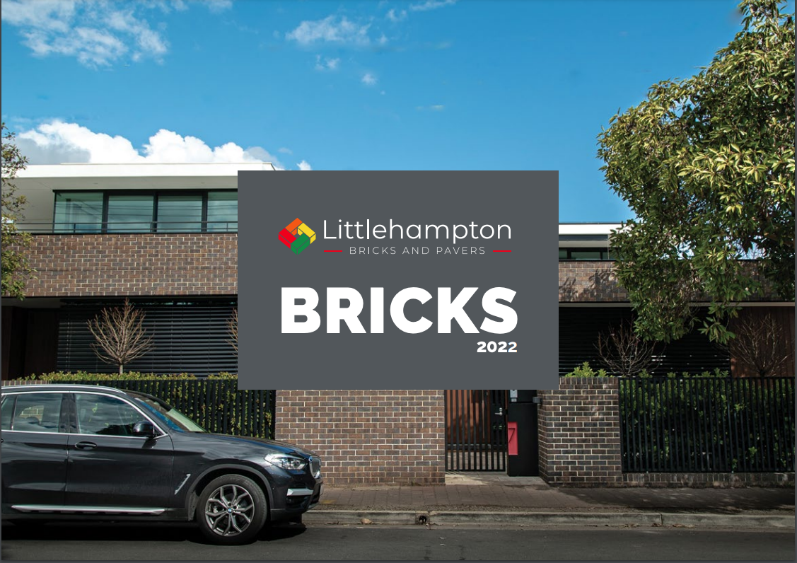 Littlehampton bricks and pavers bricks brochure with a building made from brown bricks behind the label of the brochure and the bonnet of a black car in the foreground on the left hand side