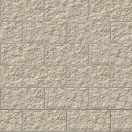 A textured wall composed of GB Split Face Limestone bricks, laid out in a staggered pattern. Each rectangular beige stone boasts a rough, uneven surface that enhances the rustic look, with visible mortar lines between the stones.