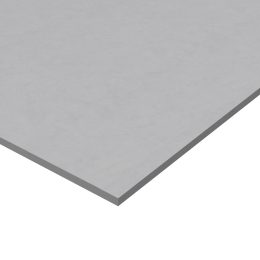 A close-up view of a gray, rectangular Compressed Fibre Cement Sheet with a slightly textured surface. The image focuses on the corner and edge of the sheet against a white background.