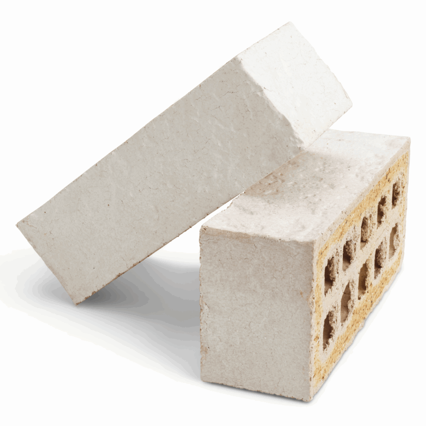 Two Coastal Hampton Washed White bricks, one flat with visible holes and one diagonally on top, are displayed on a white background.