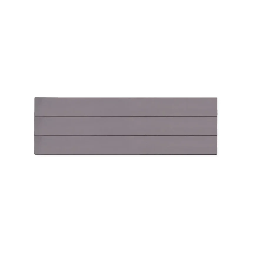 The Explorer Smooth Sleeper Charcoal, a rectangular object with four horizontal grooves evenly spaced across its surface, is set against a plain white background.