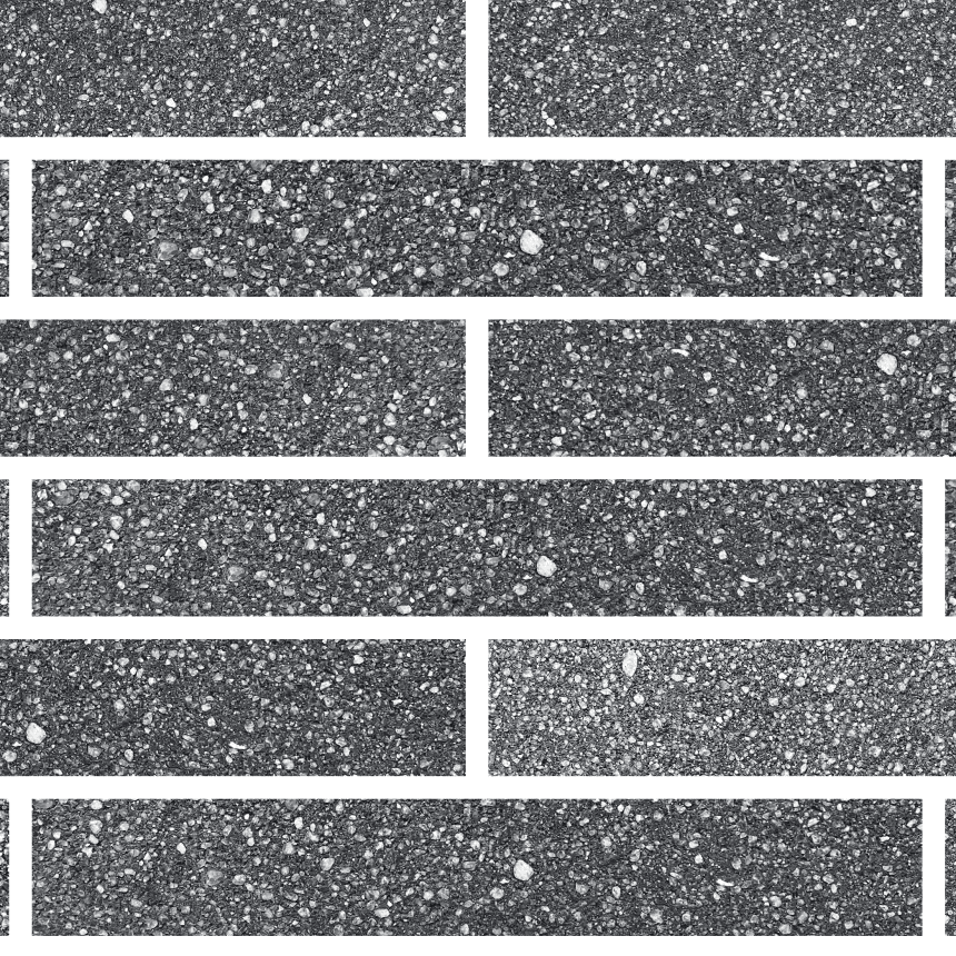 A close up Bespoke Bricks for the Future Colour Swatch Graphite Refined wall