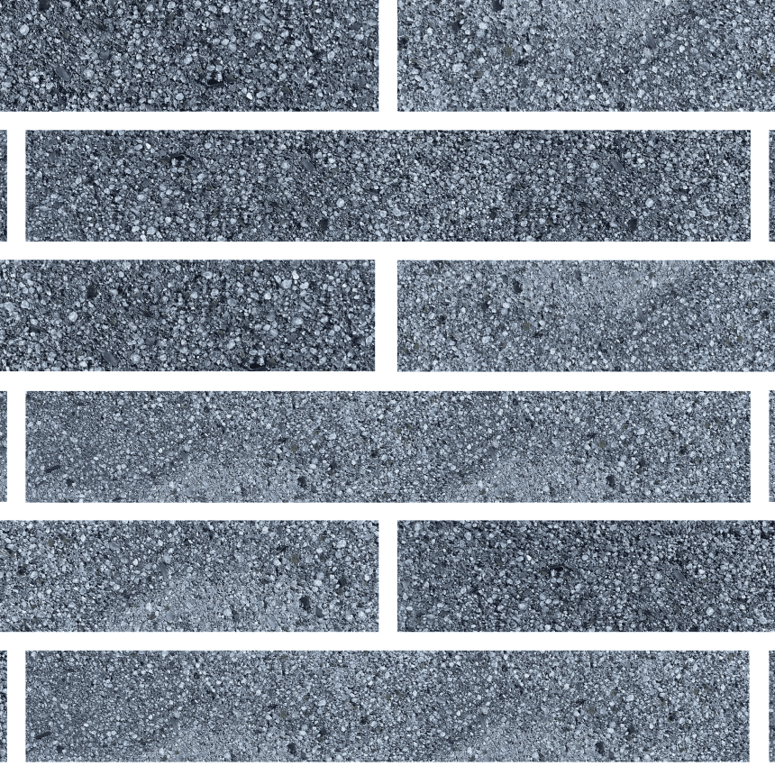 A close up of a Bespoke Bricks for the Future Colour Swatch Storm Grey ECO Refined wall