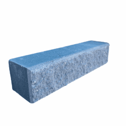 A single Broughton Garden Edge Basalt rectangular concrete brick in blue-gray, isolated on a white background.