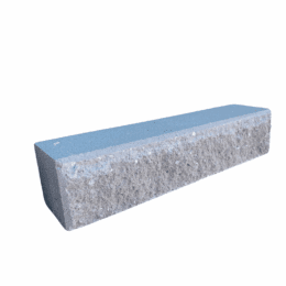 The Broughton Garden Edge Bushrock concrete block features a rough-textured face and smooth top, displayed against a white background.