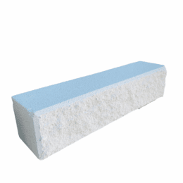 The Broughton Garden Edge Basalt is a rectangular sharpening stone featuring a blue, smooth top and a rough, white bottom, displayed on a plain white background.