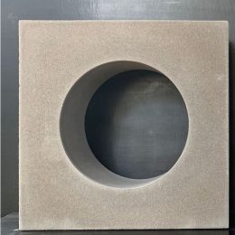 The Breeze Block Circular Grey is showcased against a dark background, featuring a large circular hole at its centre.