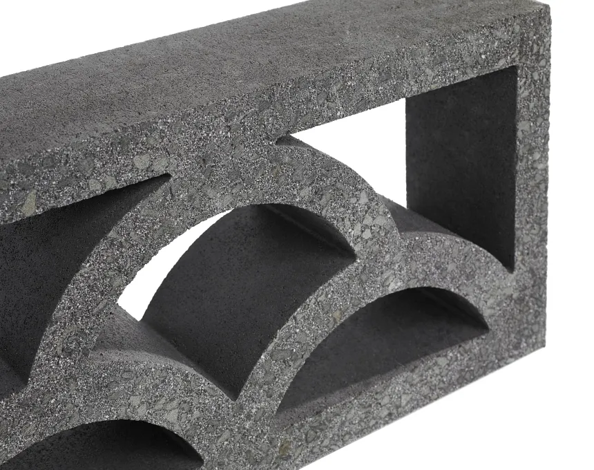 A close-up of the GB Breeze Blocks Cloud Pewter concrete breeze block, featuring geometric rectangular and semicircular cutouts, displayed against a white background.