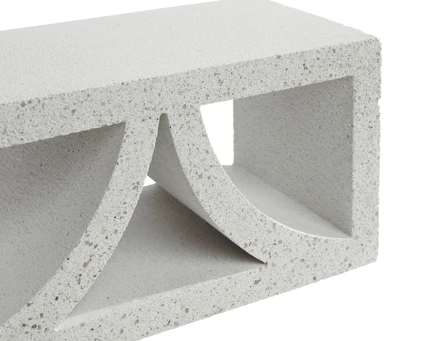A close-up of the GB Breeze Blocks Arc Pottery in light grey, featuring two large rectangular openings, a central curved divider, and a rough, pottery-like surface with visible small specks.