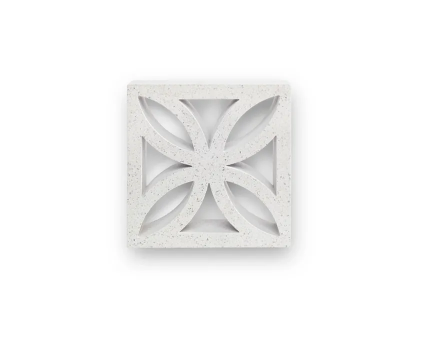 The GB Breeze Blocks Flower Porcelain is a square white block featuring four symmetrical, almond-shaped cutouts forming a floral or geometric pattern at the center, shown against a plain white background.