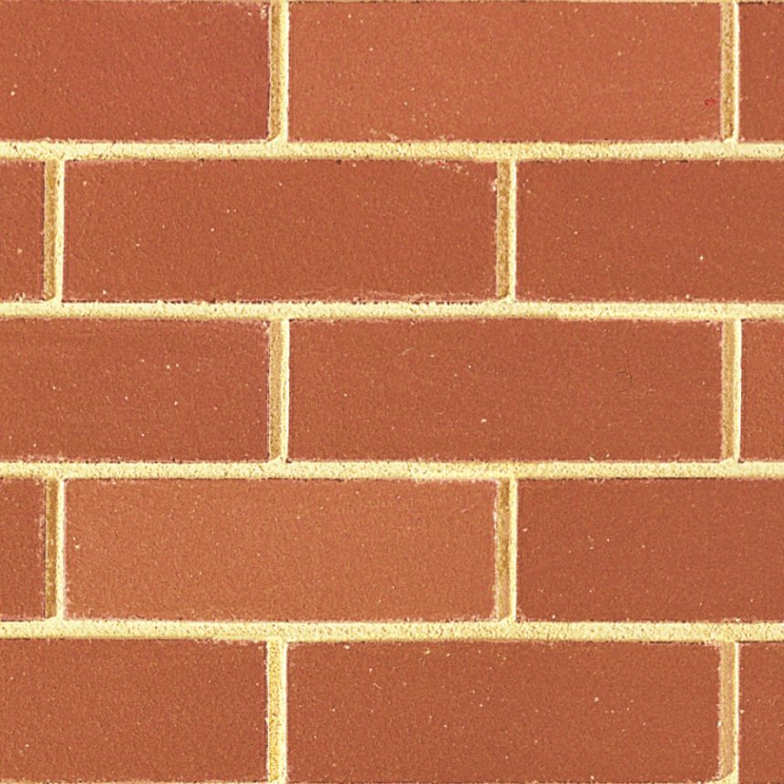 A close-up image of a Red Smooth brick wall with a sleek, smooth finish. The bricks are rectangular and uniformly arranged, showcasing an even pattern with light-colored mortar in between.