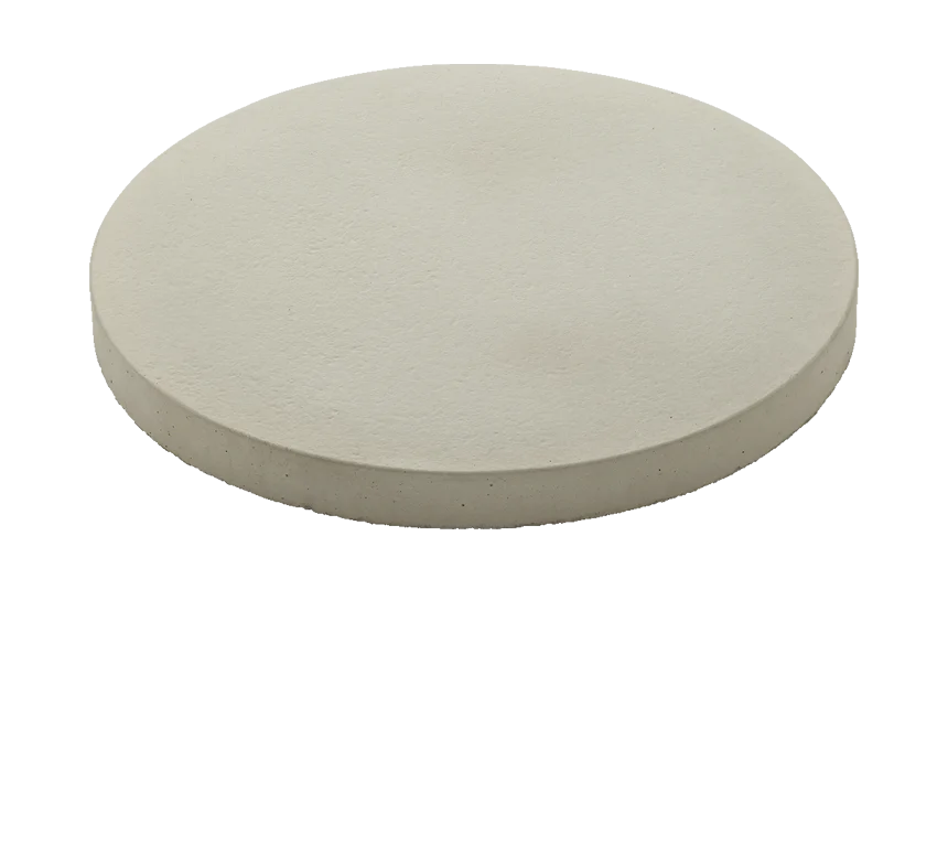 A round, flat trivet crafted from linen, identified as the Abode Circle Linen, is displayed against a white background with a NEW label positioned in the top right corner.