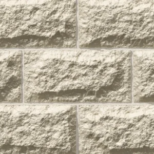 A close-up of a GB Sandstone Rockface Limestone wall shows rough, light beige rectangular stones in a staggered layout with thin mortar joints.
