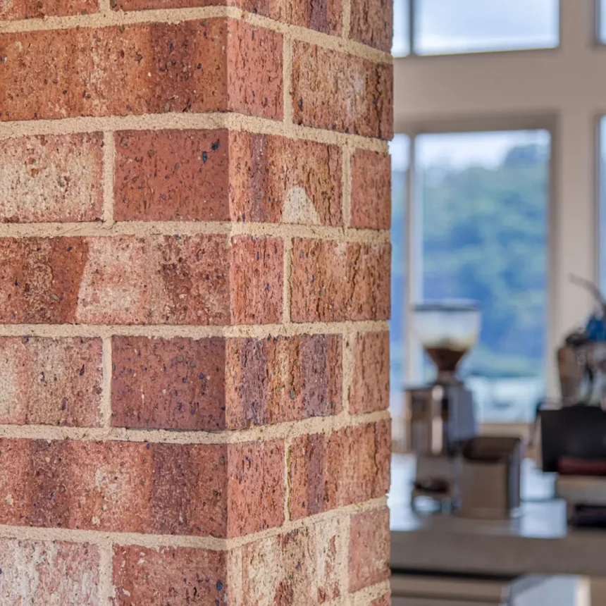 A close up of a brick pillar inside a house using Flinders Bricks from Littlehampton Bricks