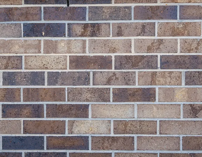 The Murray Darling wall features horizontal reddish-brown bricks with light gray mortar, echoing the earthy tones of its namesake region. The bricks display subtle color and texture variations, forming an evenly structured and well-maintained appearance.