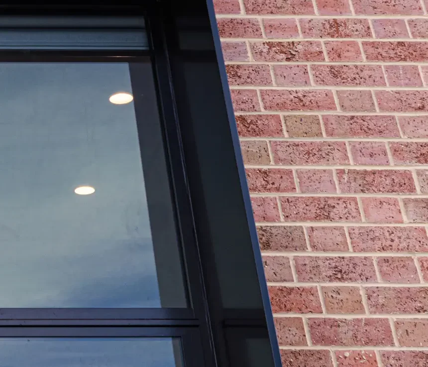 light cabernet brick from littlehampton Bricks and Pavers in a wall with a bit of a window as part of the wall
