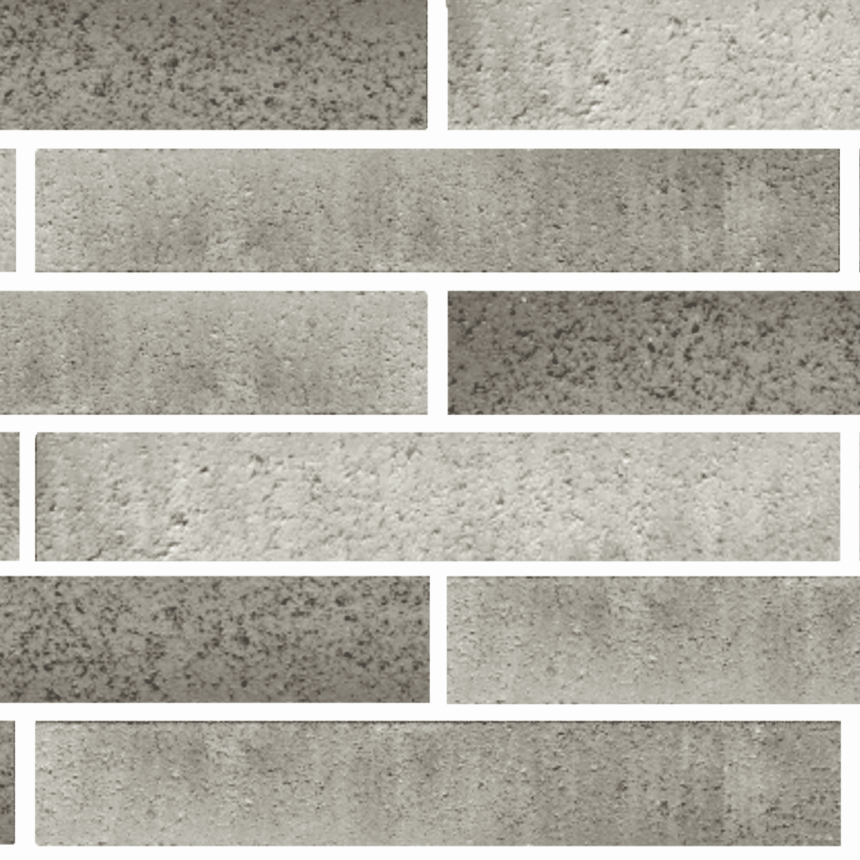 Rectangular gray bricks, Bespoke Almond Eco, arranged in a staggered pattern. Some bricks have a speckled texture, adding a modern and refined look to the wall.