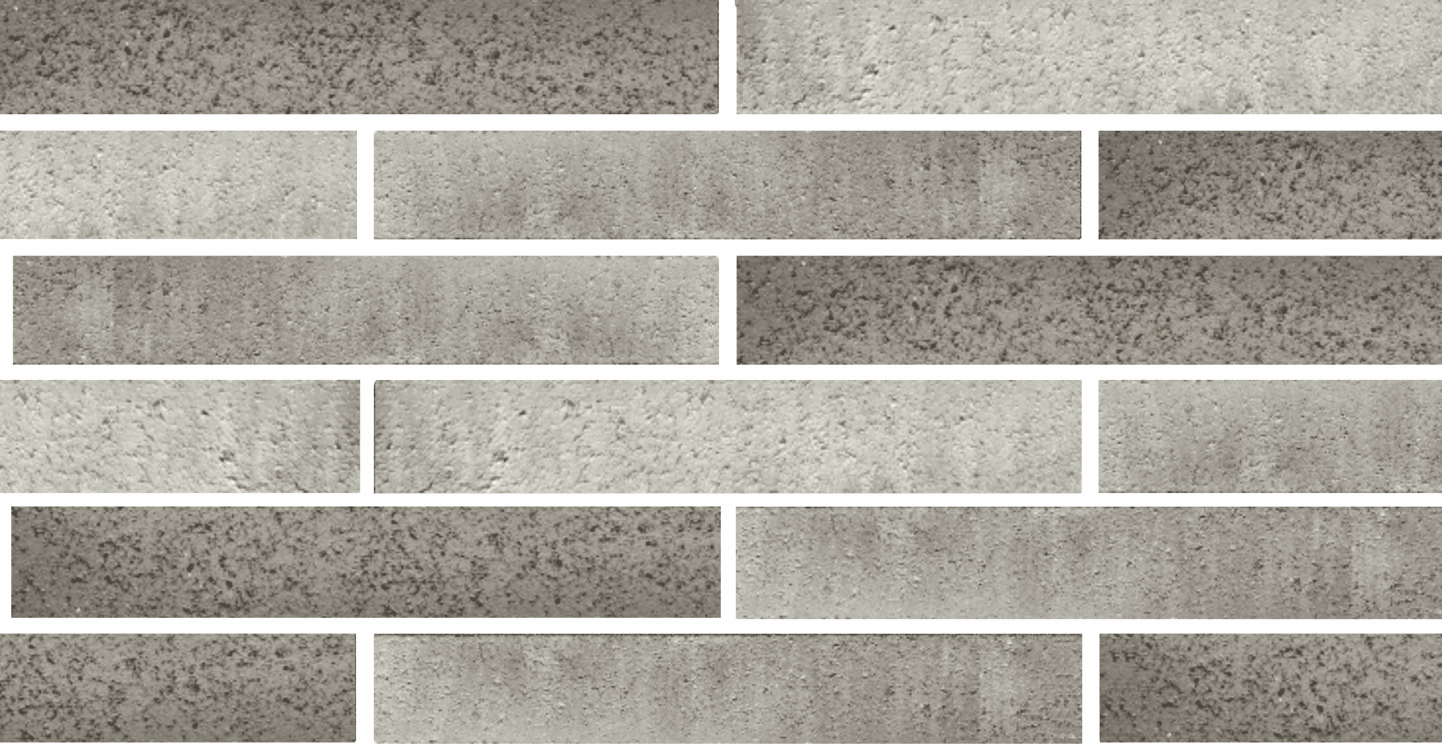 Rectangular gray bricks, Bespoke Almond Eco, arranged in a staggered pattern. Some bricks have a speckled texture, adding a modern and refined look to the wall.